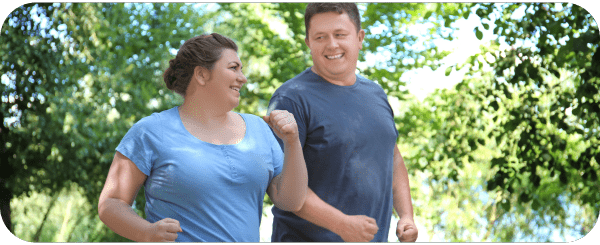 Two happy people going for a run together