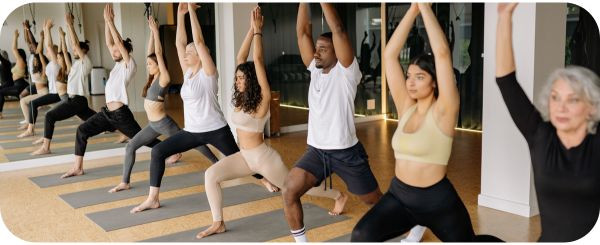 People attending a Yoga fitness class