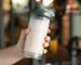 A man holding a shake with creatine